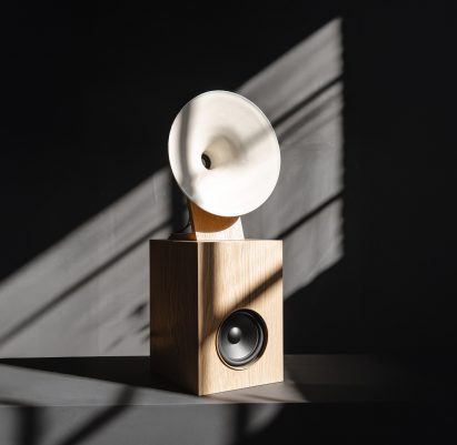 A speaker made from ceramic and wood