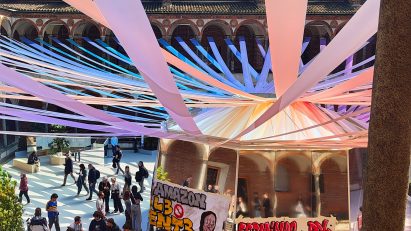 Protest banners on MAD installation at Milan design week