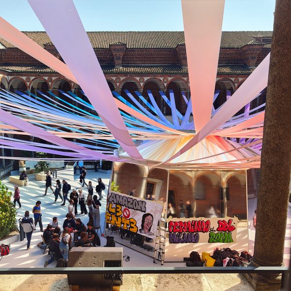 Protest banners on MAD installation at Milan design week