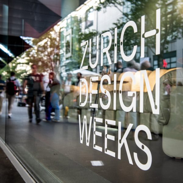 Photo of Zurich Design Weeks text on a window