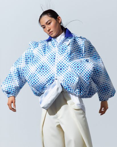 Person weaaring an-cooled jacket by Anrealage 
