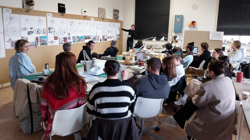 a photograph of a group of students in a classroom