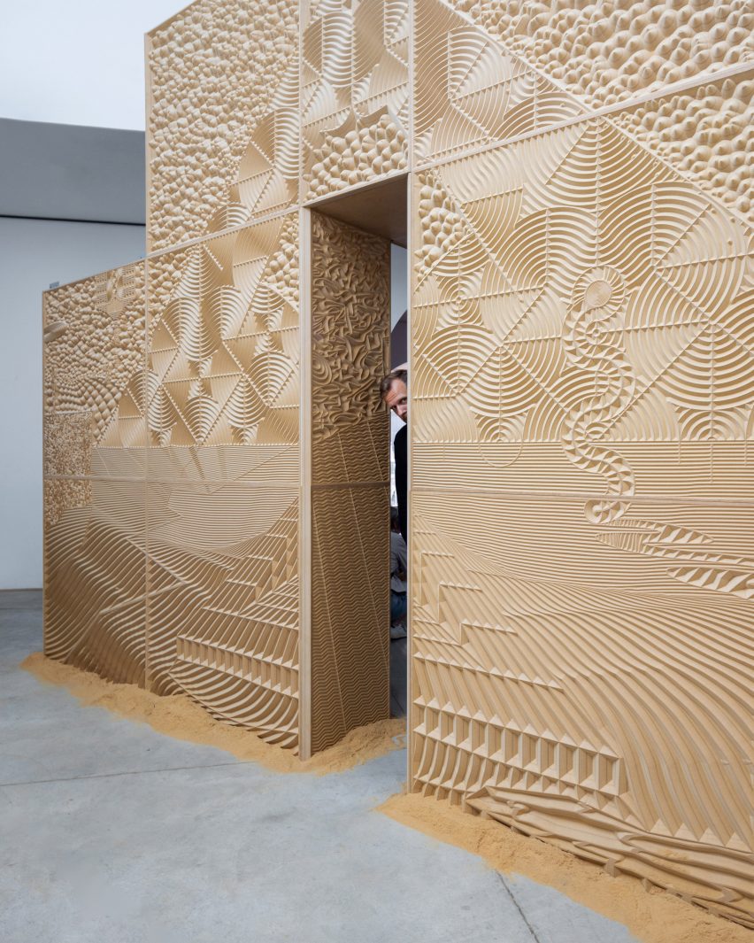 Hoogland made the waste sawdust part of the exhibition design