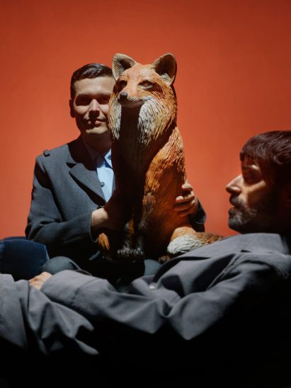 Portrait of Formafantasma posed with a plastic fox