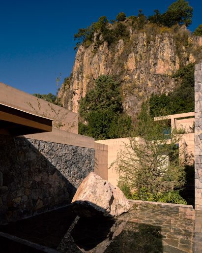 Volumes tucked around mountain