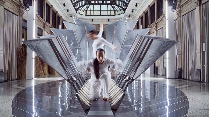 Dancers moving through Studio INI's installation