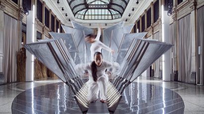 Dancers moving through Studio INI's installation