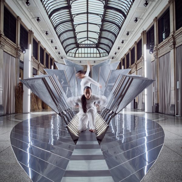 Dancers moving through Studio INI's installation