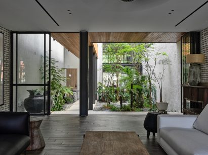 Living space interior at Oku House by Freight Architects