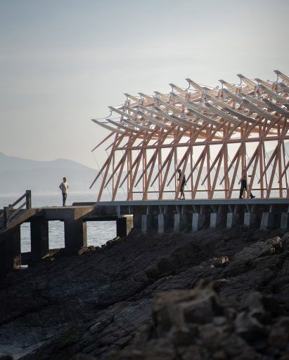 People walking through The Seaside Pavilion in China