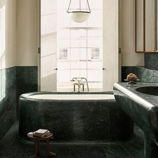 Green marble freestanding bath by Child Studio