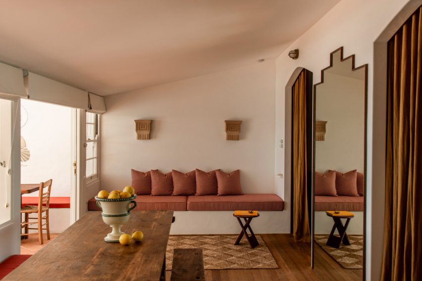 Interior with wall lights and banquette