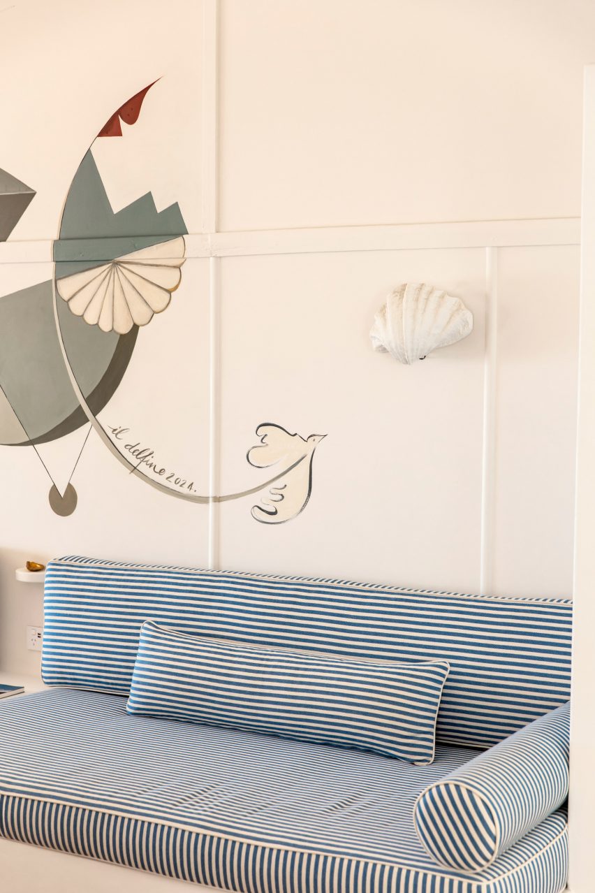 banquette seating with mural