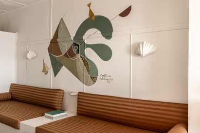 Mural above banquette seating