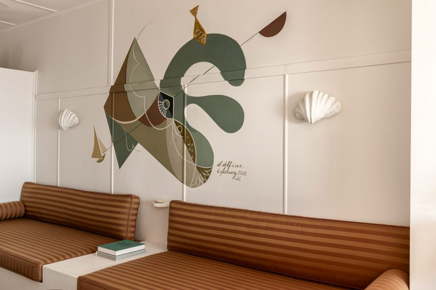 Mural above banquette seating