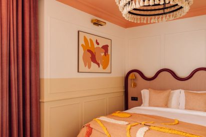 bedroom area with statement headboard