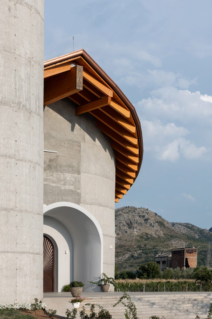 Entrance to a concrete church in Albania by Arkpro Studio