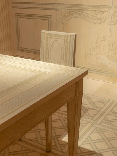Chair and table embroidered with metal threads