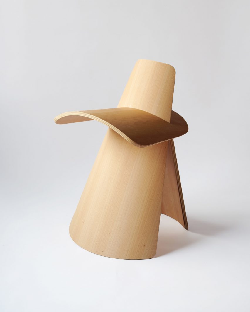 Wooden stool with sculptural shape