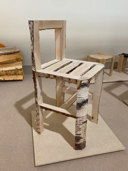 Wooden chair with bark left