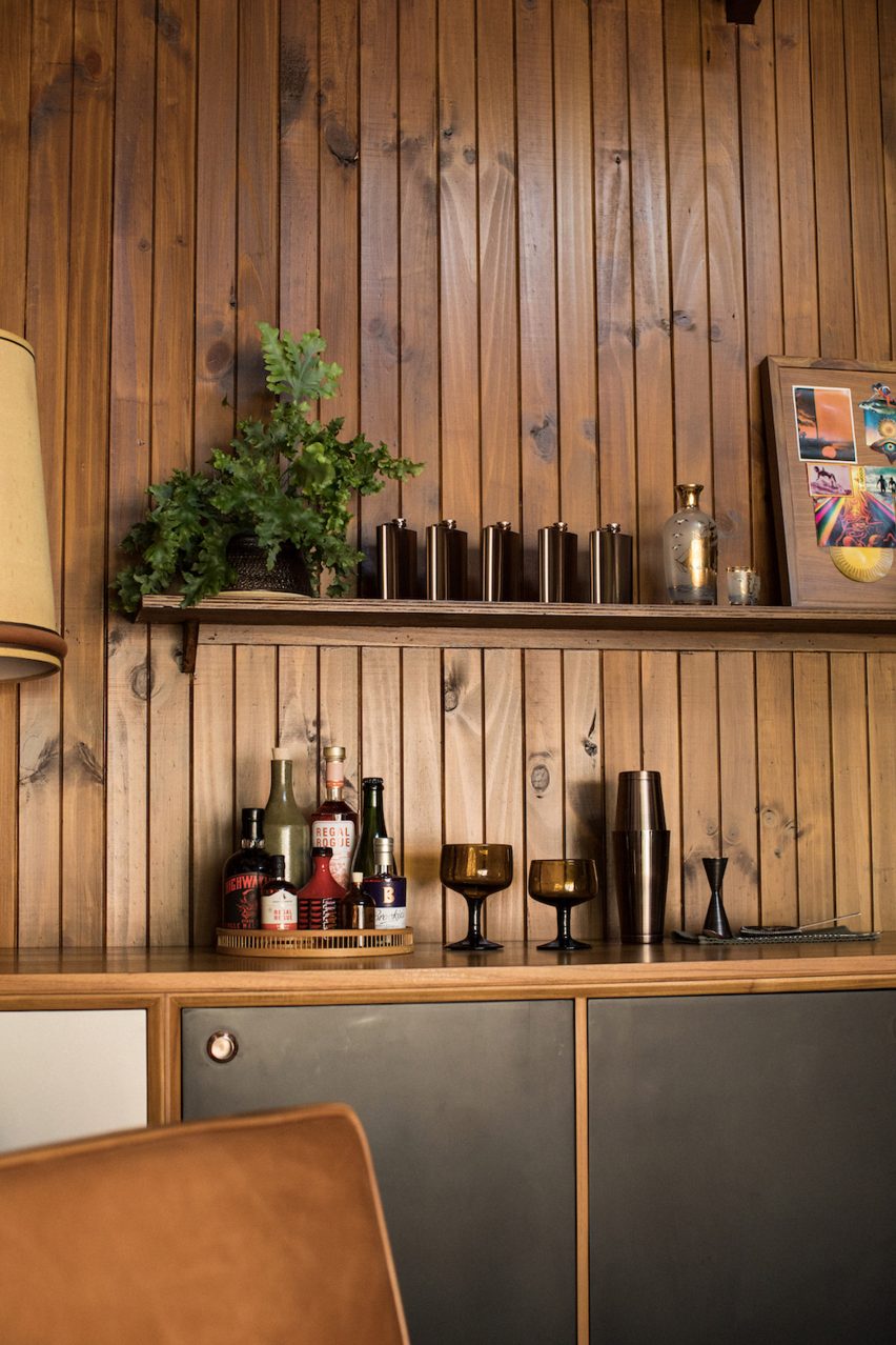 Wood-panelled 1970s-style interior