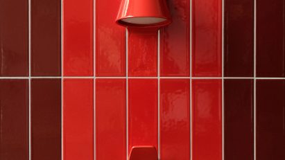 Red UU Tiles by Unknown Untitled with hook and light coming out of them