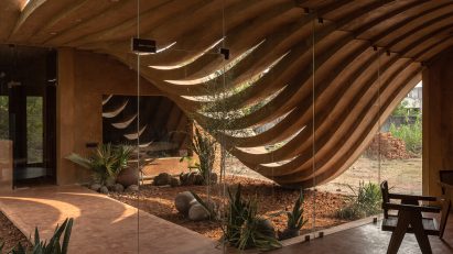 Curved concrete roof Indian house