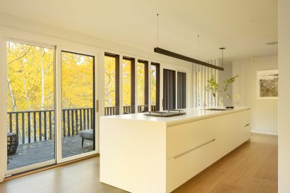 Kitchen with surrounding views