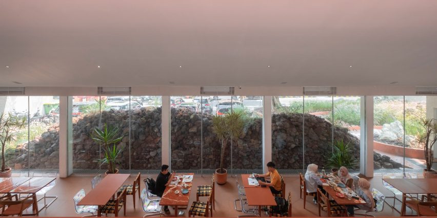 Mounded stones outside glass window