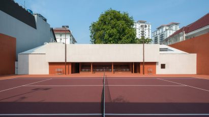 At the rear of the project is a sunken tennis court