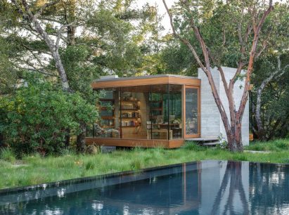 Office with two concrete slabs and reflection pool