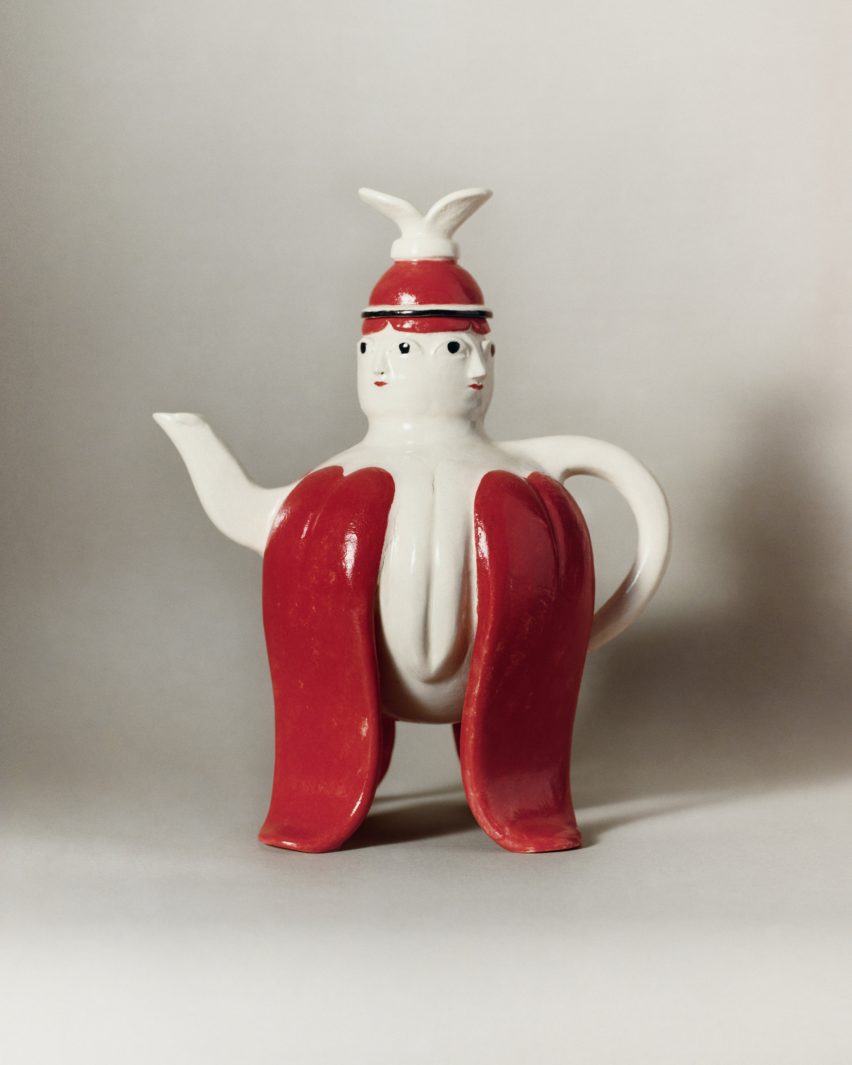 Teapot shaped like two people