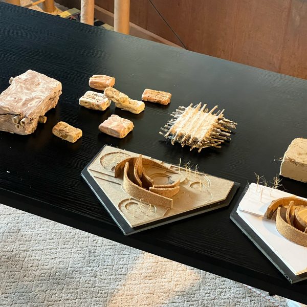 a photograph of material research placed on a a black table