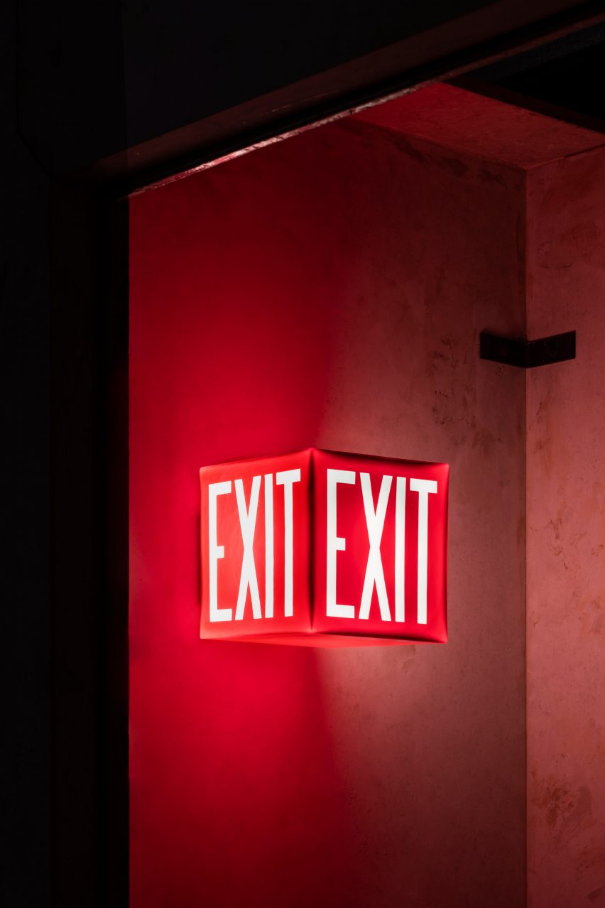 Exit wall sconce
