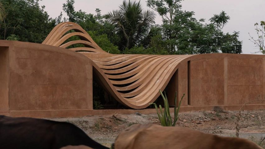 Curved concrete roof India house