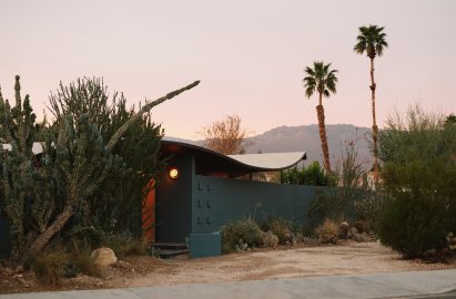 Miles C Bates house exterior with desert flora and palm trees