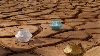 Pots placed on a cracked earth surface