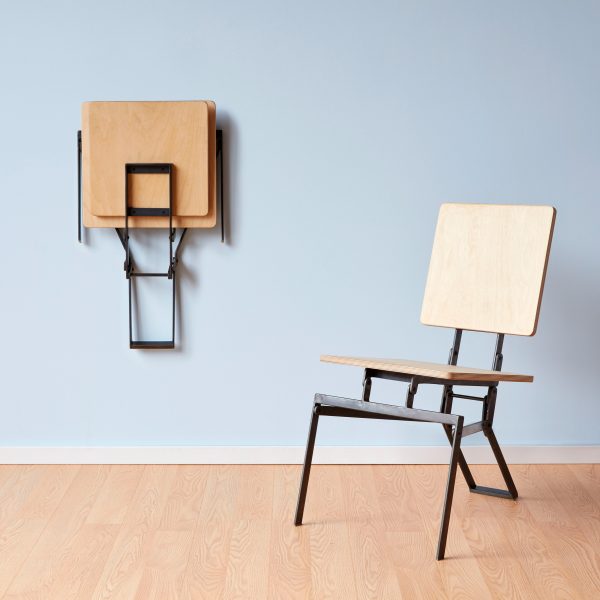 Photo of chairs, one folded and one standing, by Eric Jacoby Design