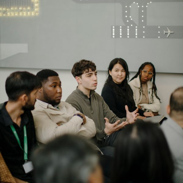 Students discussing something as part of an education event