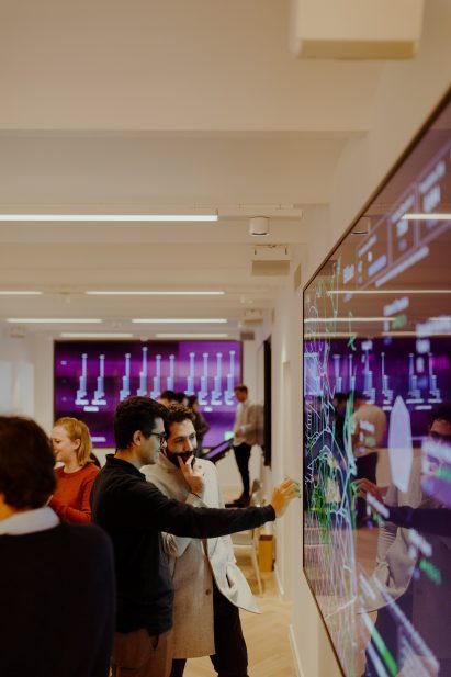 Students looking at a screen as part of an education event