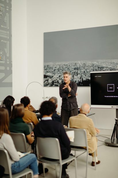 An academic lecturing a class
