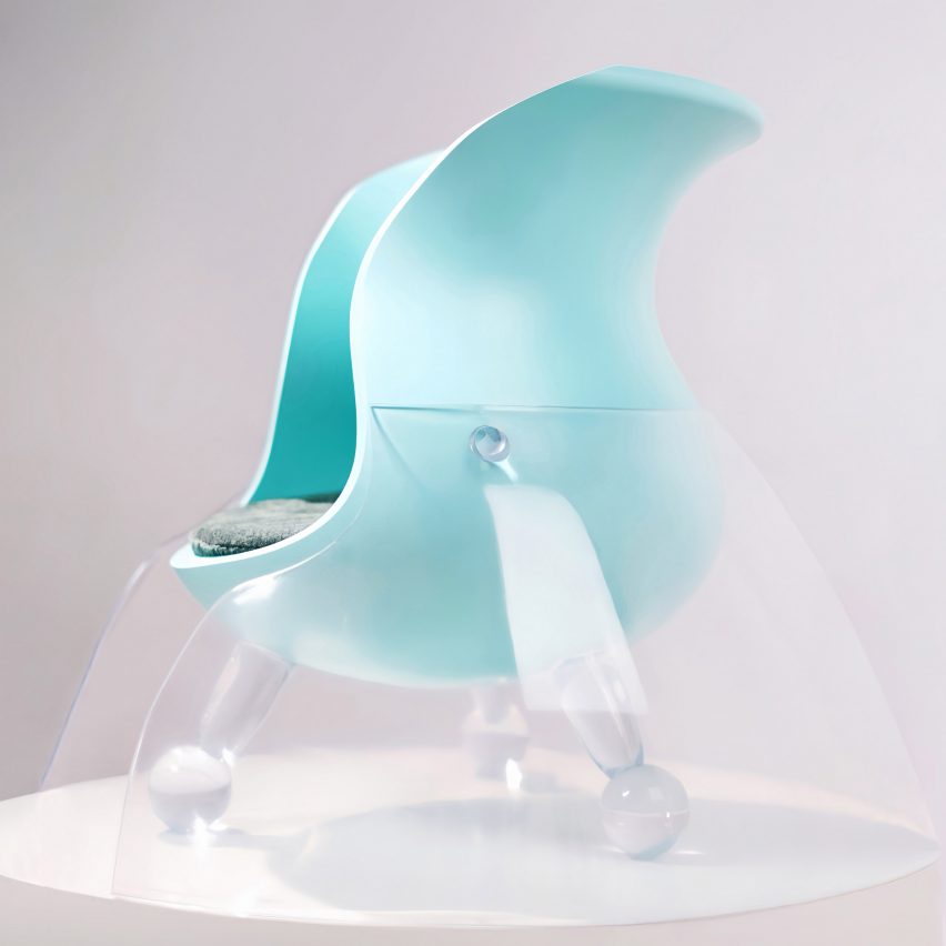 a photograph of a plastic stool, featuring clear plastic and a blue seat, designed for children
