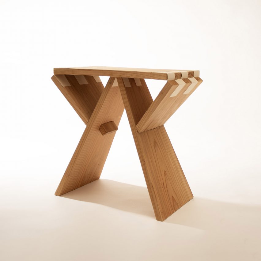 a photograph of a wooden stool in tones of brown