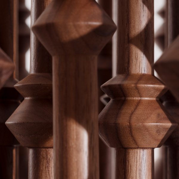 Close up of wooden table legs by Xena Kalouti