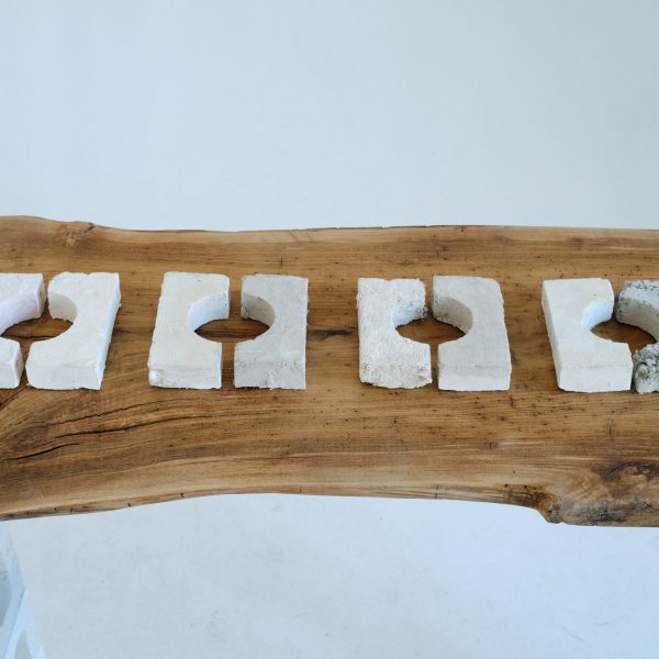 Photo of wooden table with materials on it