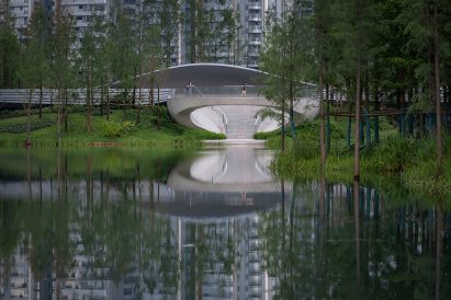 View across lake of Ring of Starlight stage in China