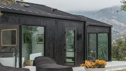 Mountain home with blackened timber exterior
