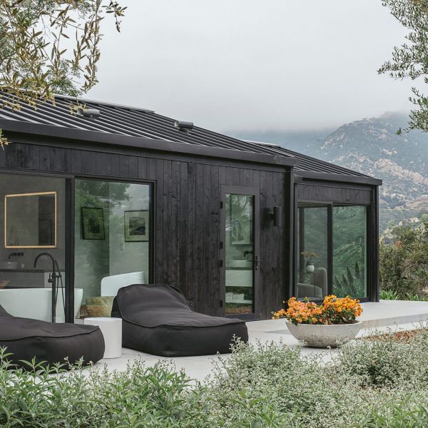 Mountain home with blackened timber exterior