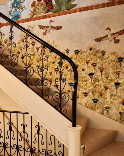 Stairwell with tapestry in jewellery boutique in Burlington Arcade designed by Universal Design Studio