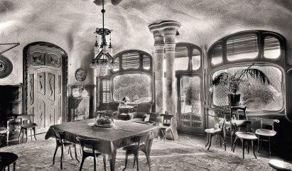 Black-and-white interior view of Casa Battló with several Battló Chairs